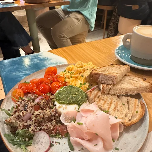 This is hands-down, the best brunch I've had anywhere in the world. I'm scared to write this review because I don't want it to become more crowded than it already is. Our waiter Thomas was friendly, kind, attentive and always smiling. The food is absolutely exquisite. The wonderful coffee drinks warm the soul.